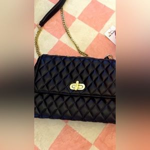 Brand new couture handbag. Gold chain and hardware. Beautiful!